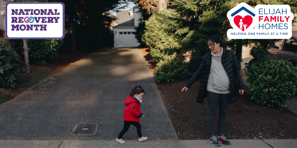National Recovery Month and Elijah Family Homes logos above a mother and young child walking through a residential neighborhood.